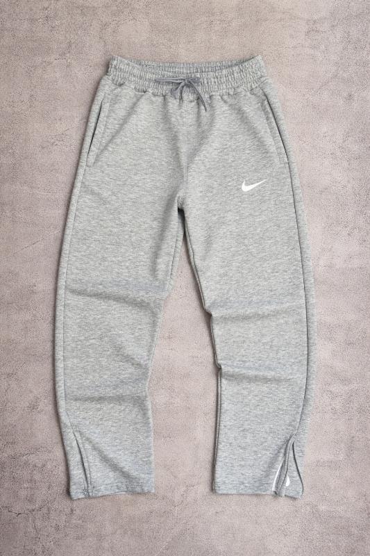 BAGGY NIKE CON CIERRE GRIS - Foto 1