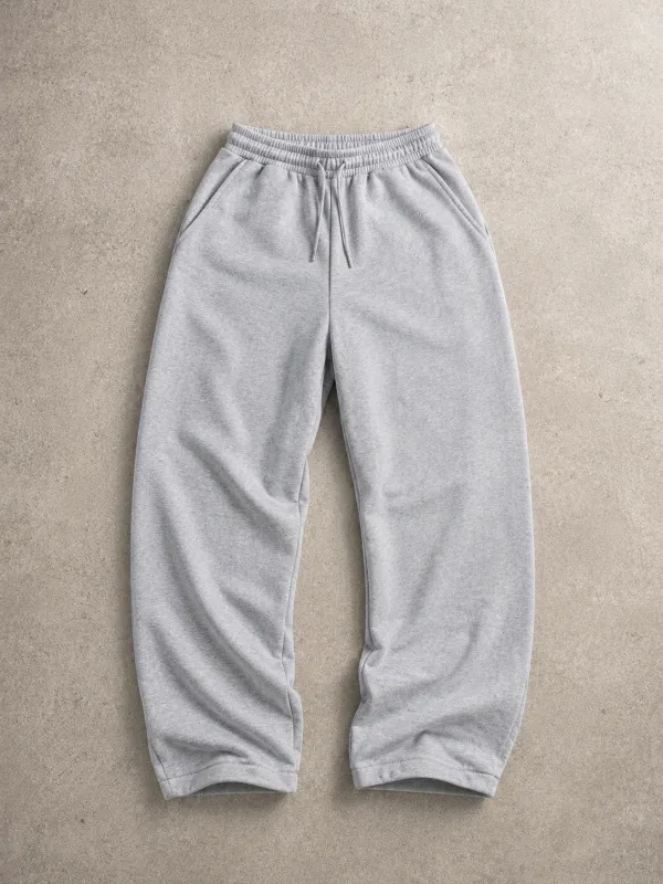 JOGGING BAGGY GRIS LISO